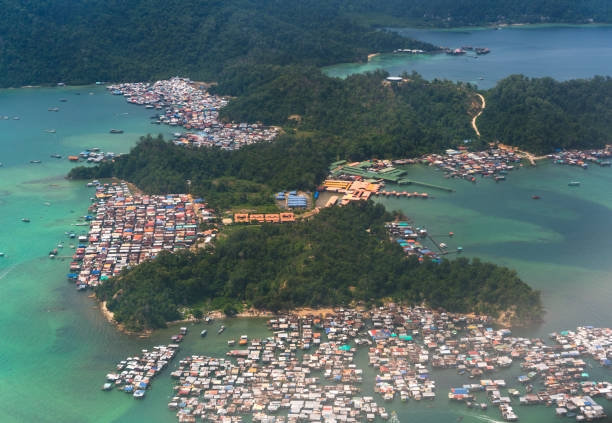 istock Traditional house on water on Borneo, Malaysia 1215122577