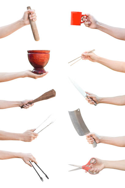 Collection of hands with different kitchen tools isolated on a white background. object with clipping path. Collection of hands with different kitchen tools isolated on a white background. object with clipping path. serving tongs stock pictures, royalty-free photos & images