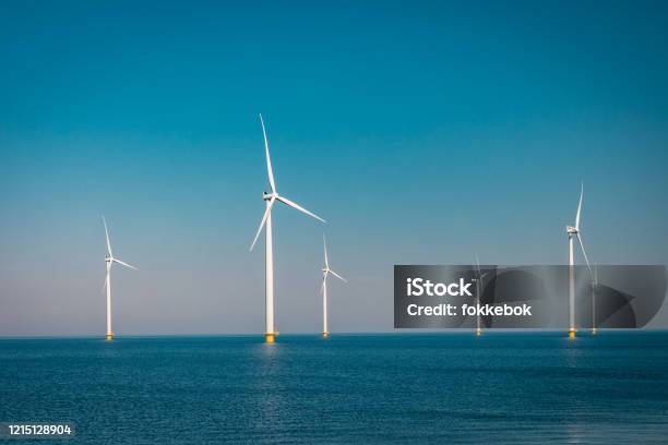 Wind Turbine From Aerial View Drone View At Windpark Westermeerdijk A Windmill Farm In The Lake Ijsselmeer The Biggest In The Netherlandssustainable Development Renewable Energy Stock Photo - Download Image Now