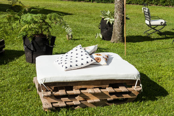 istock Lounge area for guests outside, improvised sofas 1215130258