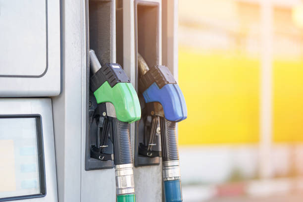 istock Gas pump nozzles in a station. 1215131641