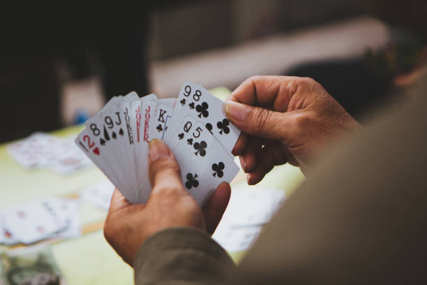 card game Closeup, people playing card game poker card game photos stock pictures, royalty-free photos & images