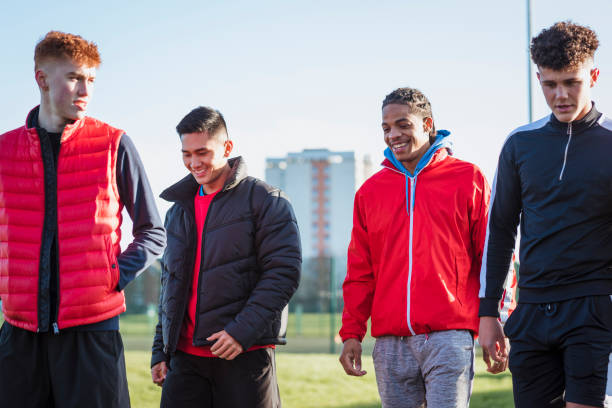 istock Friends Walking to Their Local Park 1215142511