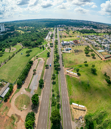 Aerial view of Campo Grande MS, Brazil - Highs of Afonso Pena avenue. Growing city with few buildings and a huge green area. Green city.