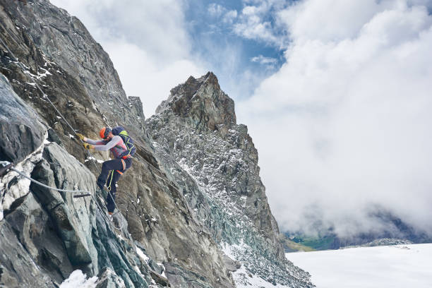 istock Mountaineer climbing Grossglockner mountain, Austria. 1215151200