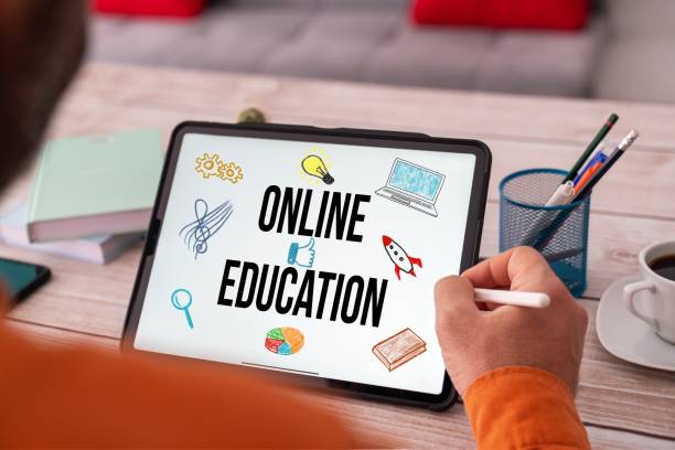 istock studying at home with modern equipments. E learning at home online. Isolation from global threat. 1215154453