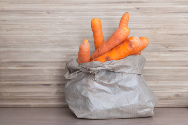carrots organic vegetable in paper sachet close up