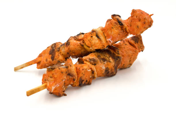 istock Grilled pork skewers isolated on white background 1215157346