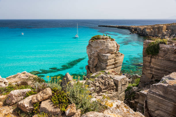 Cala Rossa in Favignana, Sicily The shore in Cala Rossa, one of the beautiful bays in Favignana, one of the Aegadian Islands in Sicily egadi islands photos stock pictures, royalty-free photos & images