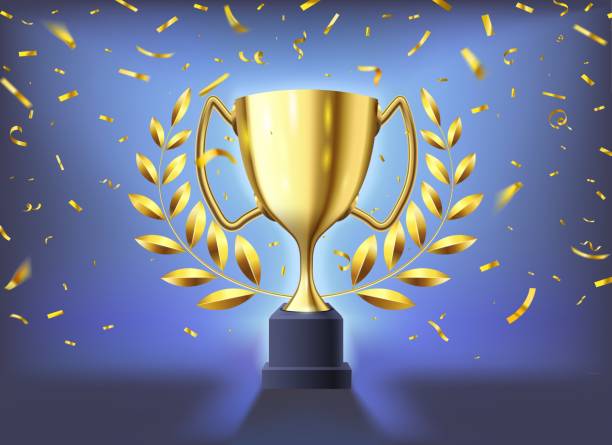 istock Realistic golden cup. Winners trophy celebration with flying confetti, glossy gold cup and sports prize with laurel wreath 3d vector illustration 1215159980