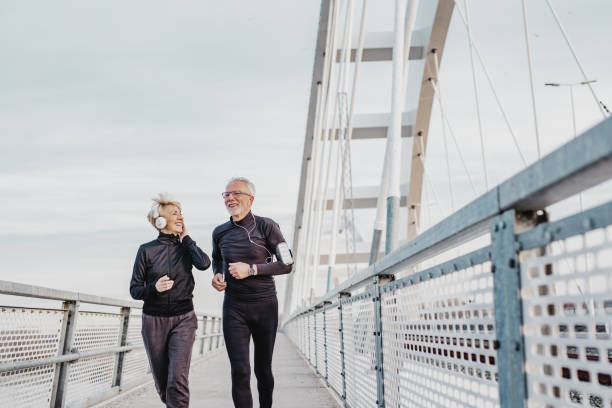 istock Senior couple jogging 1215161271