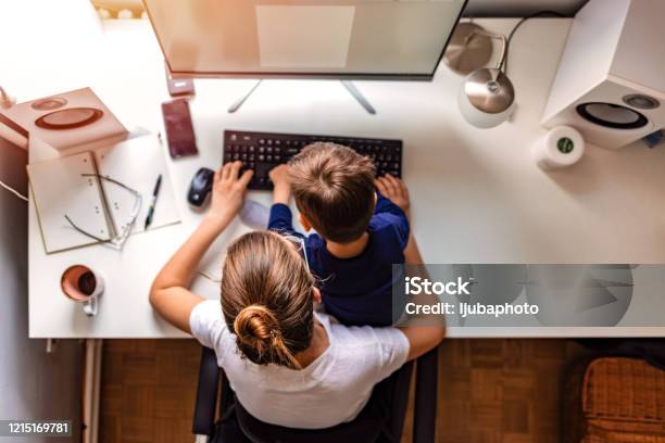 Young Mother Working From Home Stock Photo - Download Image Now - Child, Working, Mother