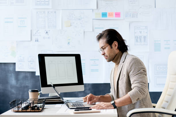 istock Manager of app design company in office 1215170139