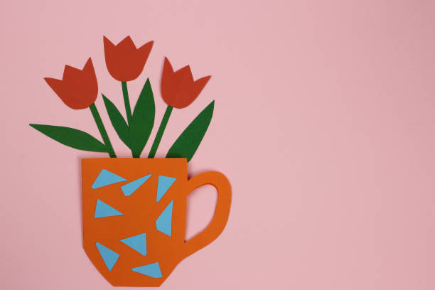 istock Postcard paper tulips, flowers in a Cup 1215170860