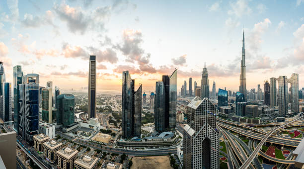 istock Panoramic View of Dubai Skyline at Sunrise 1215170861