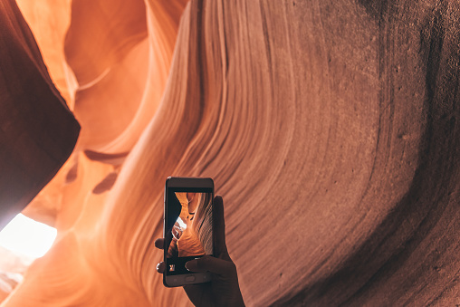 Taking pictures from personal point of view with smartphone of the Antelope Canyon