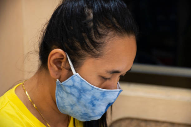 istock Thai women working and wear mask at workshop 1215173113