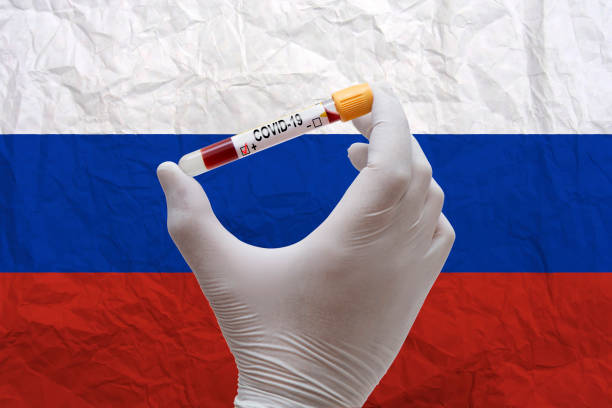 istock Coronavirus Concept With Russian Flag 1215174680