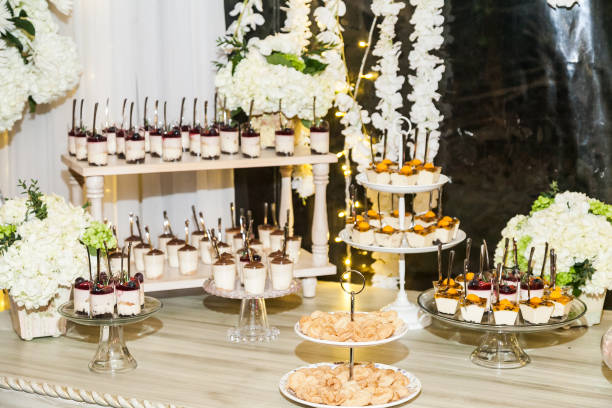 istock Delicious wedding reception candy bar dessert table 1215175018