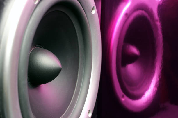 istock Acoustic column, musical speaker with purple reflection. Close up 1215176137