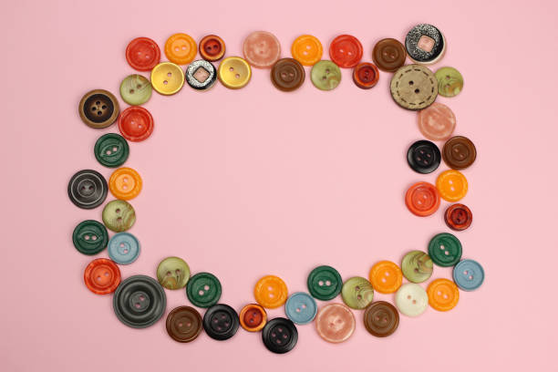 istock Frame of various sewing buttons with space for text 1215178562