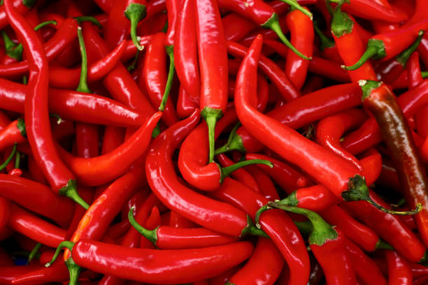 istock Red chili peppers close-up, texture. 1215178750