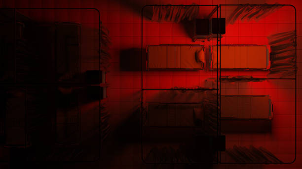 Empty Hospital Beds Illuminated by Red Light in the Dark