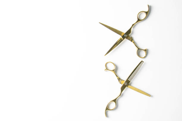 istock Open scissors for haircut isolated on a white background 1215179387