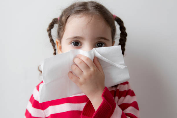 istock Little Girl Cleaning Her Nose 1215185230