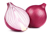 Red whole and sliced onion on white