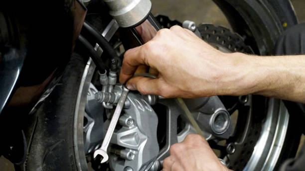 istock Bike wheel repair 1215187986
