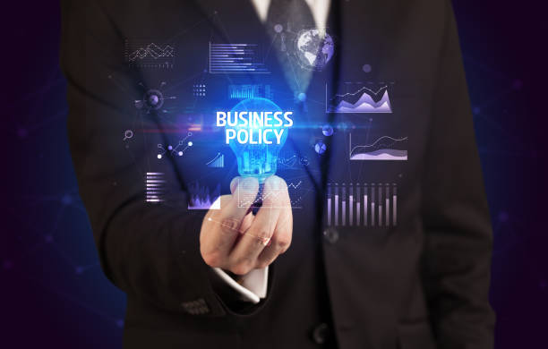 istock Businessman holding a light bulb, new business concept 1215192548