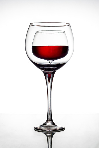 red wine splash from glass isolated on a white background.