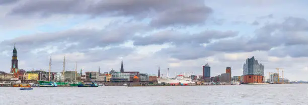 Photo of Panoramic views from Steinwerder viewpoint to the Elbe River, Elbphilharmonie, harbor, and waterfront in Hamburg, Germany.