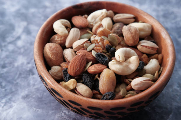 istock top view of mixed nut in a bowl on table 1215195033