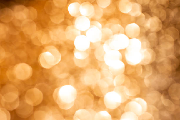 istock Golden silver glitter bokeh blurred abstract background overlay 1215195620