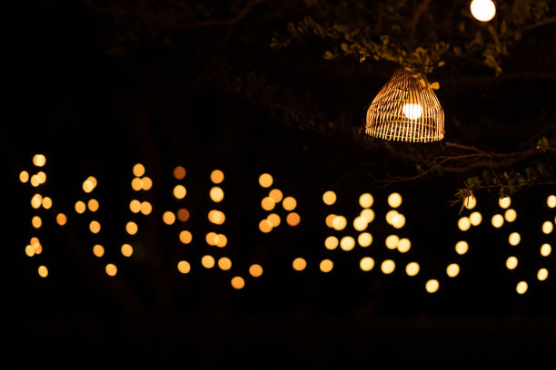 istock Lamp light and bokeh on night time background 1215197729