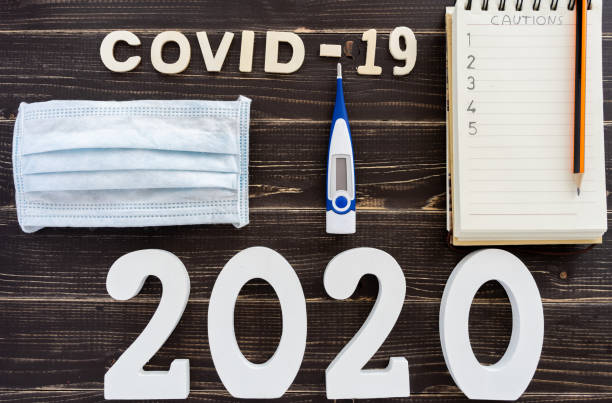 istock Conceptual image about coronavirus with wooden letters 1215197884