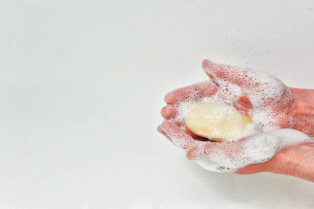 istock Washing hands with soap and foam 1215198251