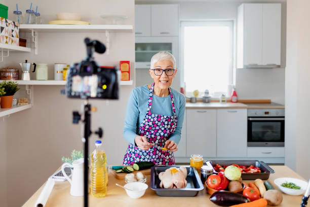istock Senior Female Vlogger Making Social Media 1215201131
