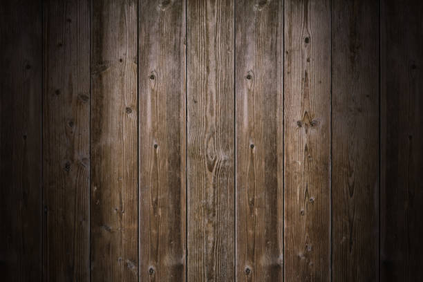ブラウンウッドテクスチャ。抽象的な背景、空のテンプレート。素朴な風化した納屋の木の背景に結び目と爪穴があります。木の板で作られた壁のクローズアップ。グランジ表面 - wood rustic close up nail ストックフォトと画像