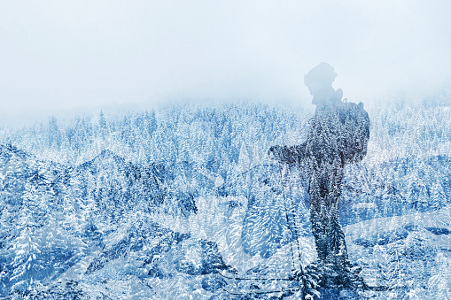double exposure of skier in beautiful mountain landscape, skiing background, winter holidays outdoors activity
