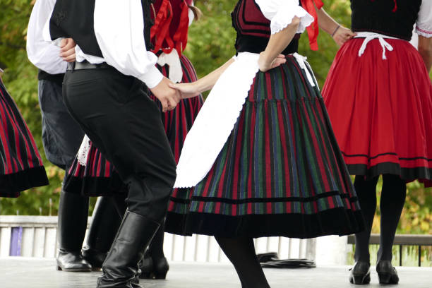 Folk groups from the district school performing traditional Hungarian folk dances on an open stage in the 12th district in Budapest, Hungary.