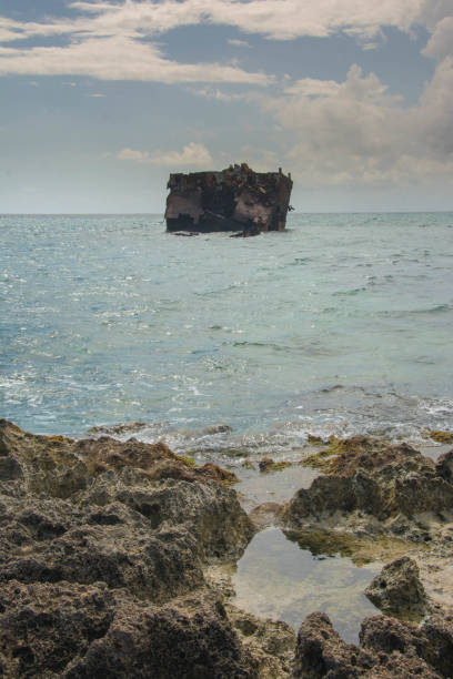 istock shipwreck at the shore of Rocky Cay 1215210753