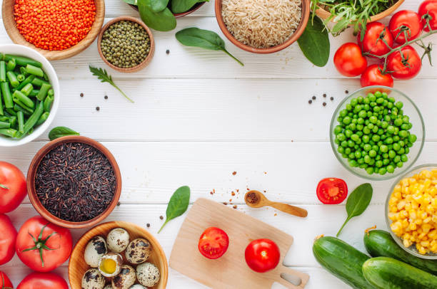 istock Frame of fresh vegetables, groats, leafy greens and quail eggs 1215211627