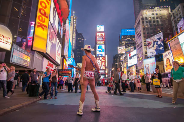 New York City, USA - July 9, 2016: Black Lives Matter protestors march down a street in Times Square in New York City, demonstrating against police violence.