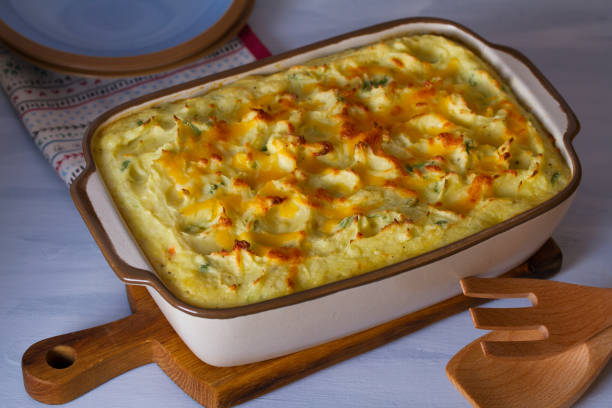 istock Creamy fish pie: salmon, cod, smoked coley, creamy sauce and cheesy potato topping 1215218827