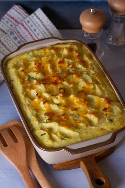 istock Creamy fish pie: salmon, cod, smoked coley, creamy sauce and cheesy potato topping 1215218845