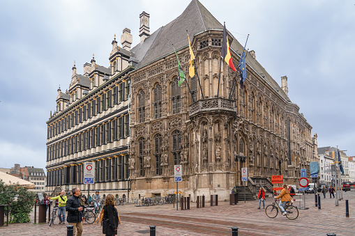 Ghent/Belgium - October 10, 2019: Town Hall (Stadhuis) boasts many facades from different sides - Gothic style facade faces the Hoogpoort and the Renaissance style - the Botermarkt