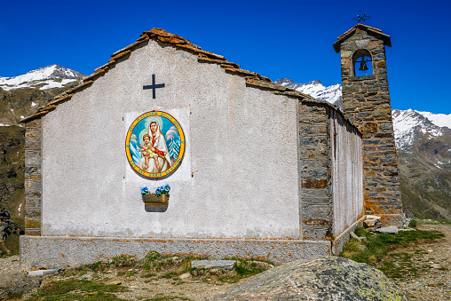 Chapel church above Idyllic Dolomites Alpine landscape – Gran Paradiso, Italy